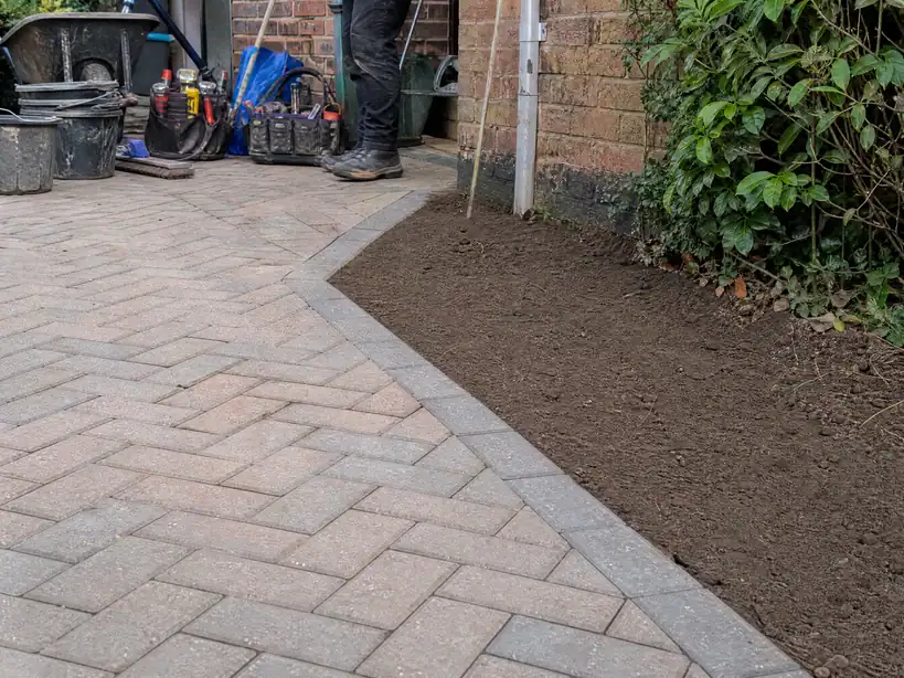 Moling pit backfilled next to block paving left completely intact, Nottingham