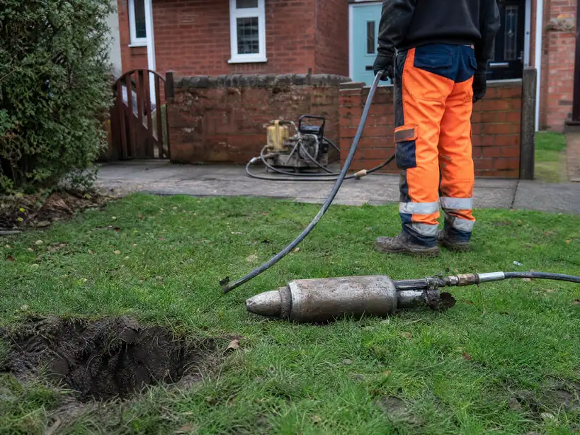 Pneumatic mole tool used to lay a new water pipe without digging a trench, Nottingham